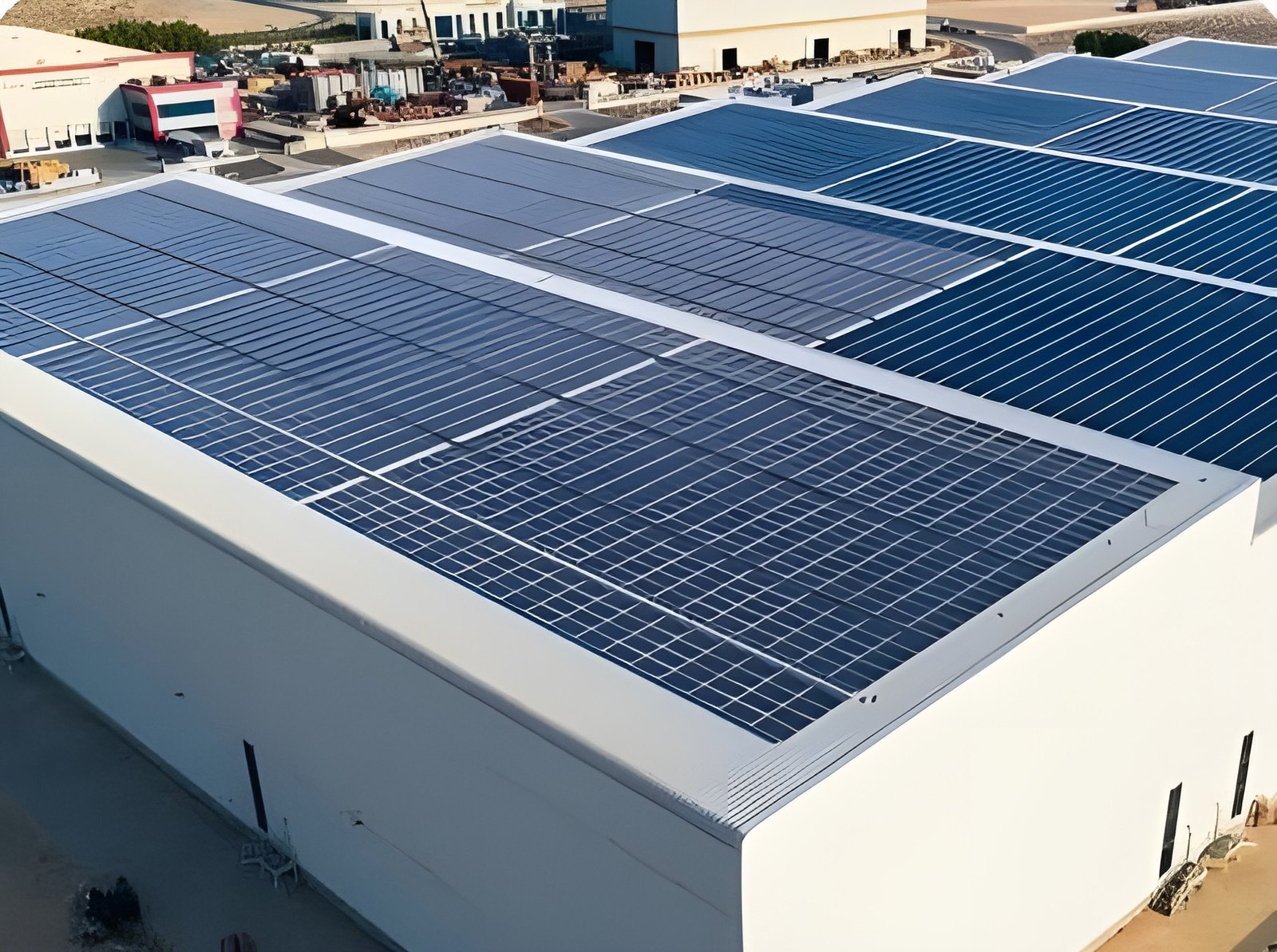 Industrial rooftop solar installation on a factory roof